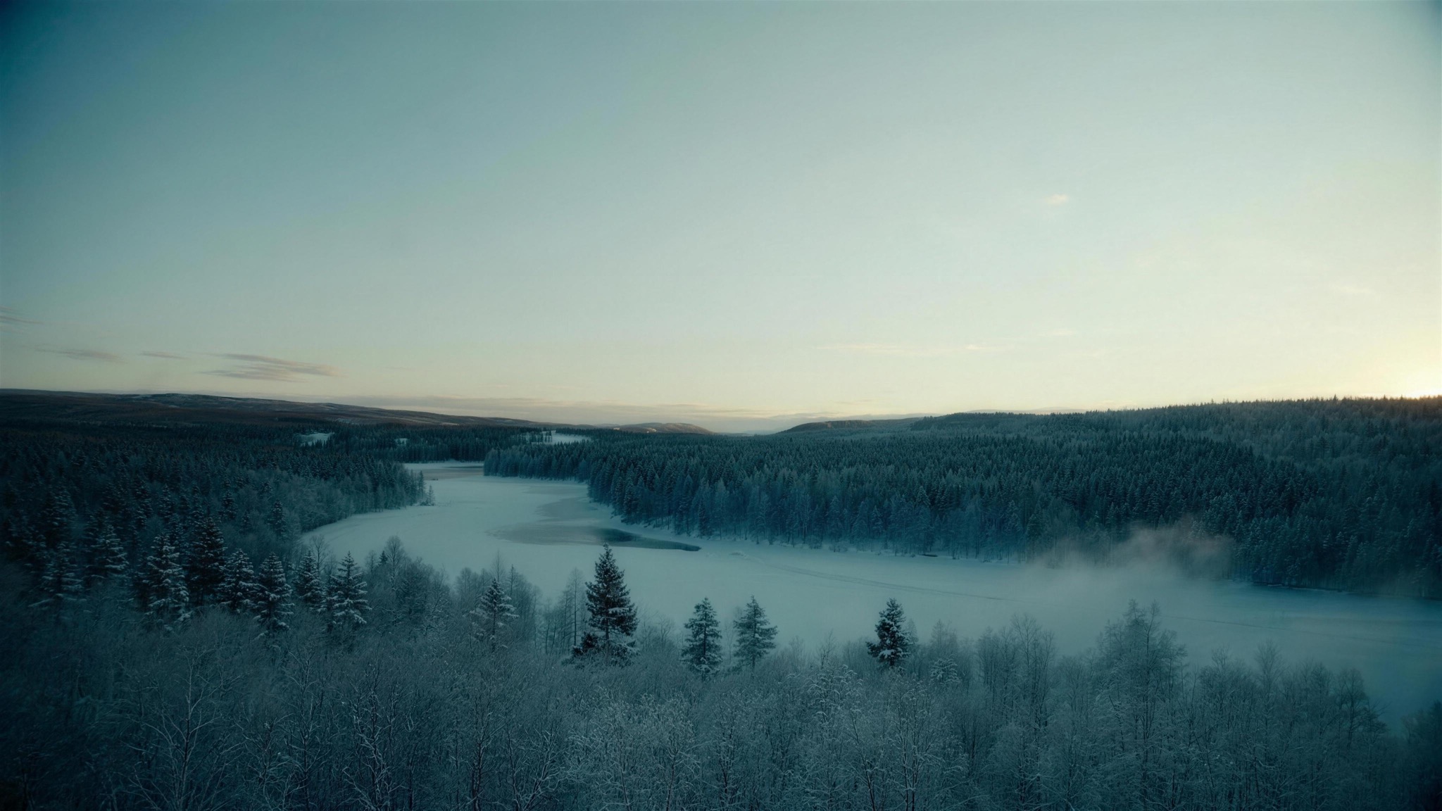 The frozen Råne river through boreal forest