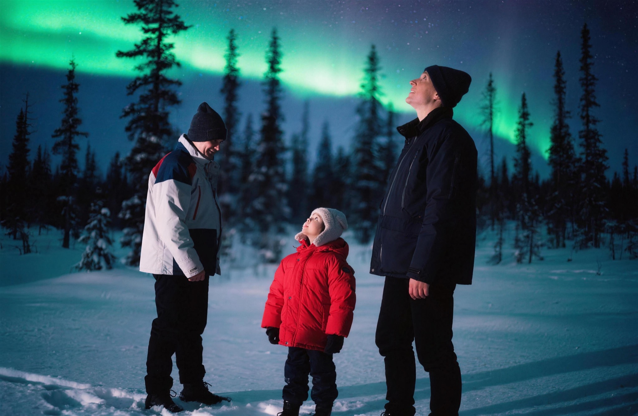 A family in awe of the aurora